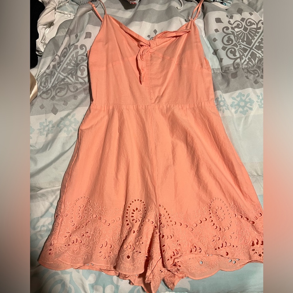 Peach Sleeveless Romper with Eyelet Hem